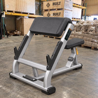 Precor Discovery Series Preacher Curl Bench (Remanufactured) in warehouse