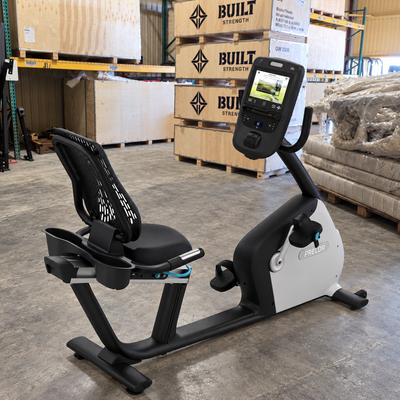Precor RBK 865 Recumbent Bike w/ P62 Console (Remanufactured) in warehouse